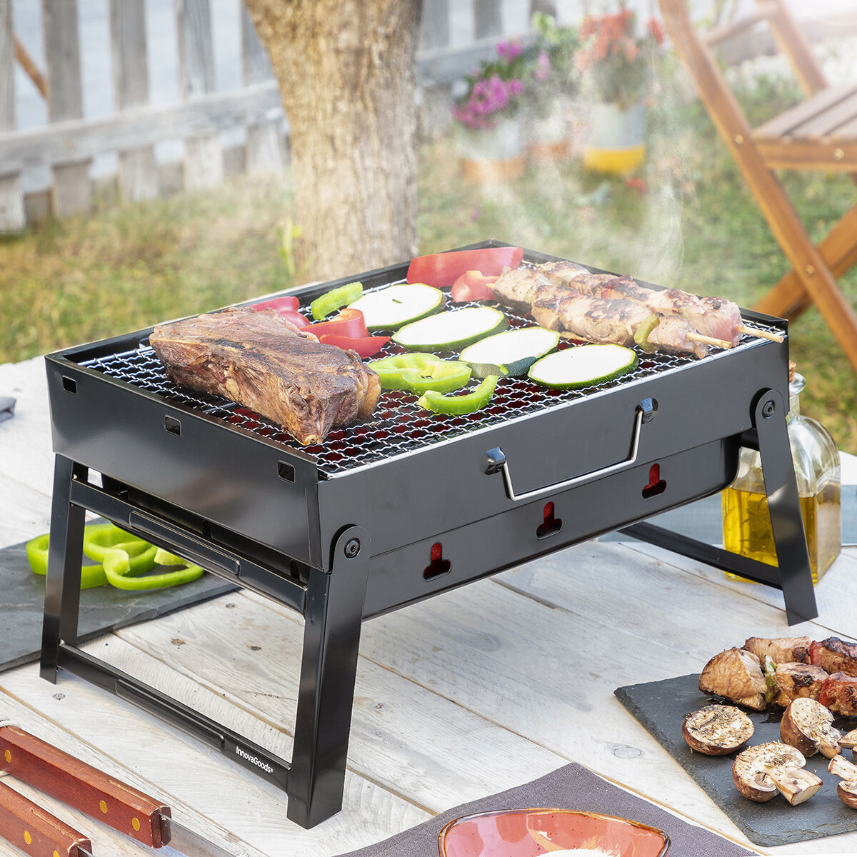 Hopfällbar bärbar kolgrill för användning med träkol BearBQ InnovaGoods - 9