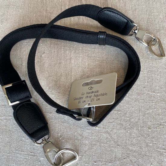 Axelrem i kraftig bomull med silverspännen