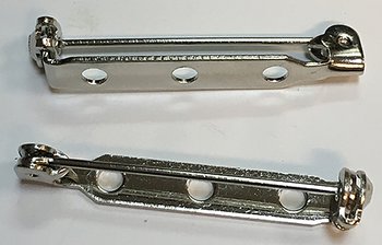Brosch fäste