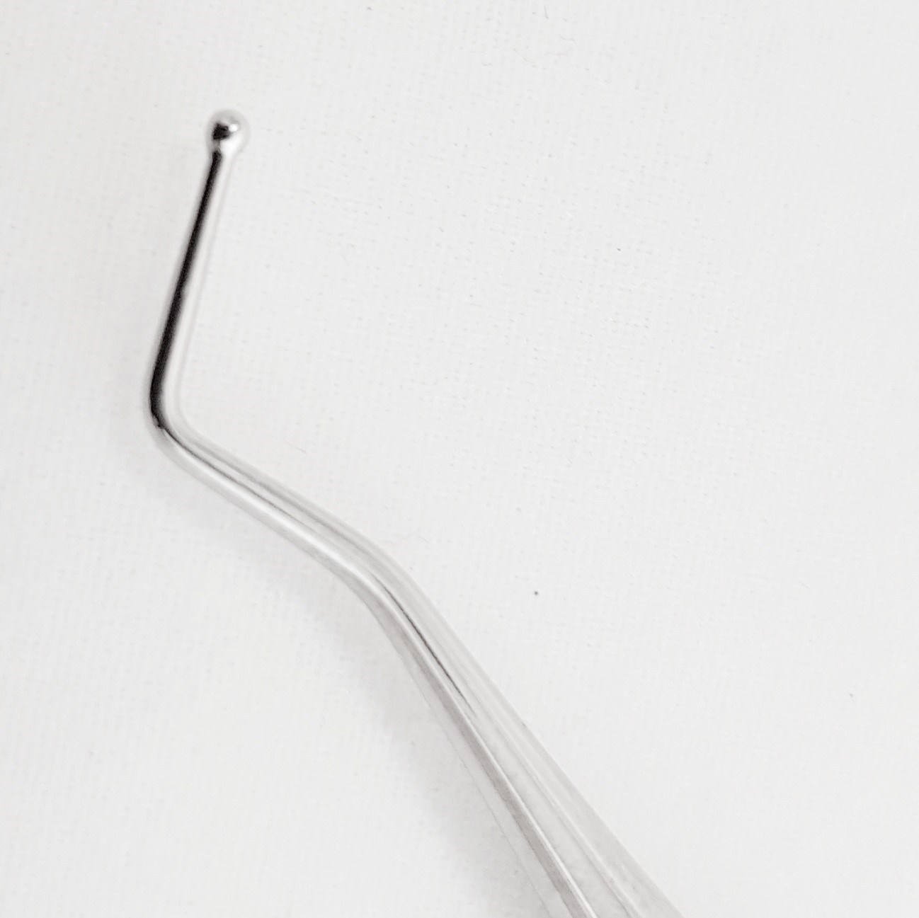 Palperpenna, fast, böjd, dubbelsidig.  Böjd i båda ändar 0,7 resp 1,2 mm storlek på kulorna - 3