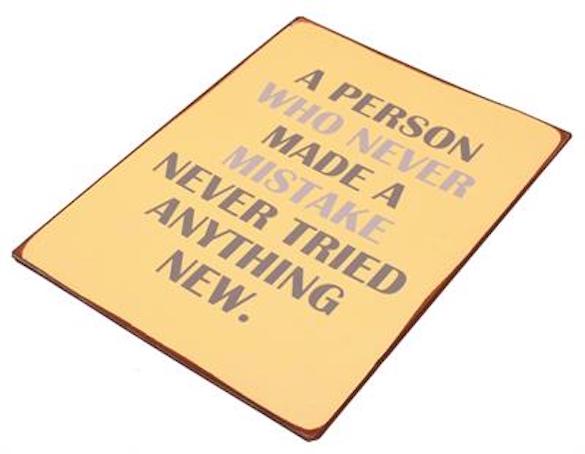 Plåtskylt – A person who never made a mistake...