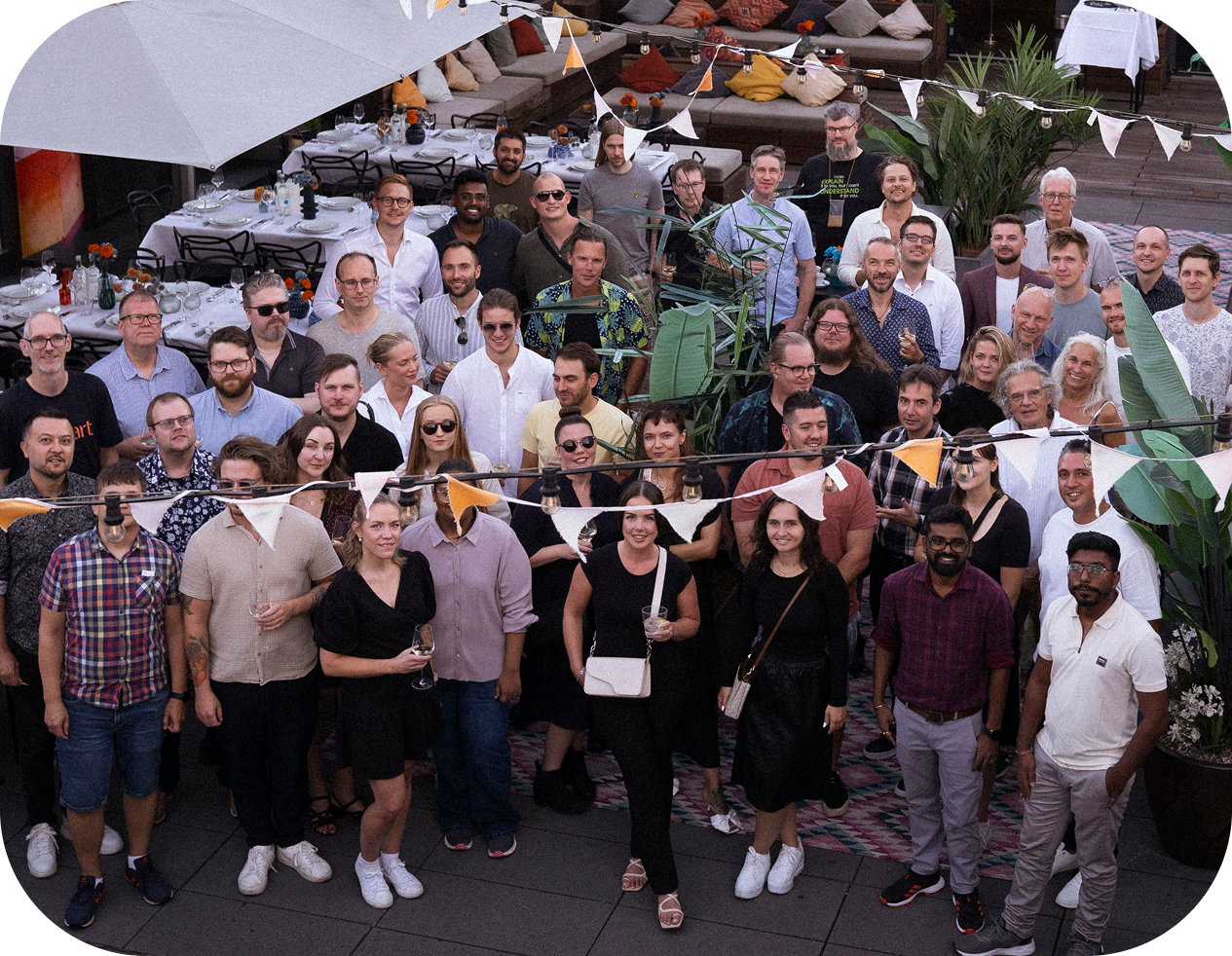 A photo showing the entire Textalk team, about 50 people smiling at the camera.